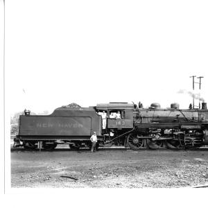 F-5 2-8-0 #163 (ex-CNE) at Waterbury, CT roundhouse in late 1940's.   Engineer's side view.