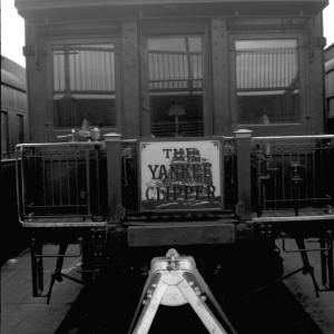 End View Of Brass-Railed Observation Car Flying Cloud Or Flying Fish On Yankee Clipper.  Location Appears To Be Dover Street Yards In South Boston, MA.