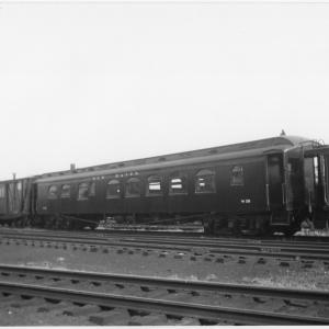 Work Train Dining Car W-153, Formerly Dining Car #2312, In tool train. Side View. Work Service Boxcars, with white script heralds and windows Cut into their doors, visible to the left of the diner. Entire tool train looks freshly painted. Work Train Dining Car W-153, Formerly Dining Car #2312, In tool train. Side View. Work Service Boxcars, with white script heralds and windows Cut into their doors, visible to the left of the diner. Entire tool train looks freshly painted.