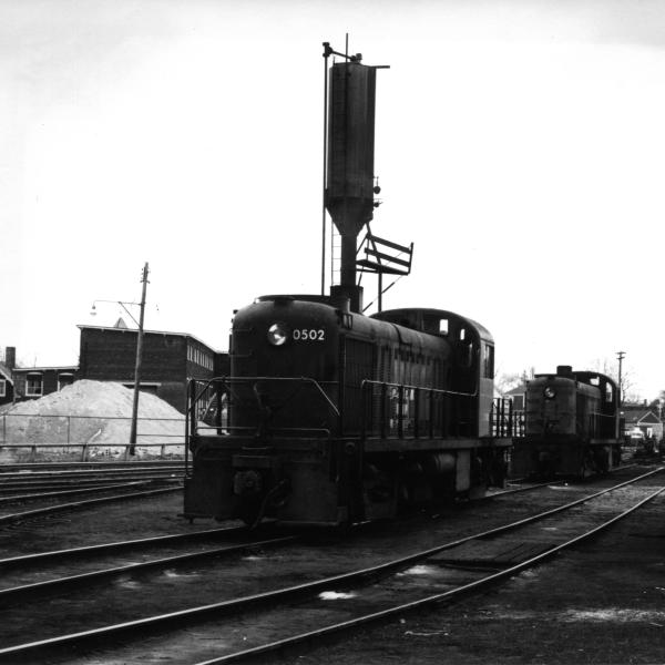 DERS-2b (RS-2) #0502 AT Taunton, MA in the 1960's.  DERS-2X in background, on sand track