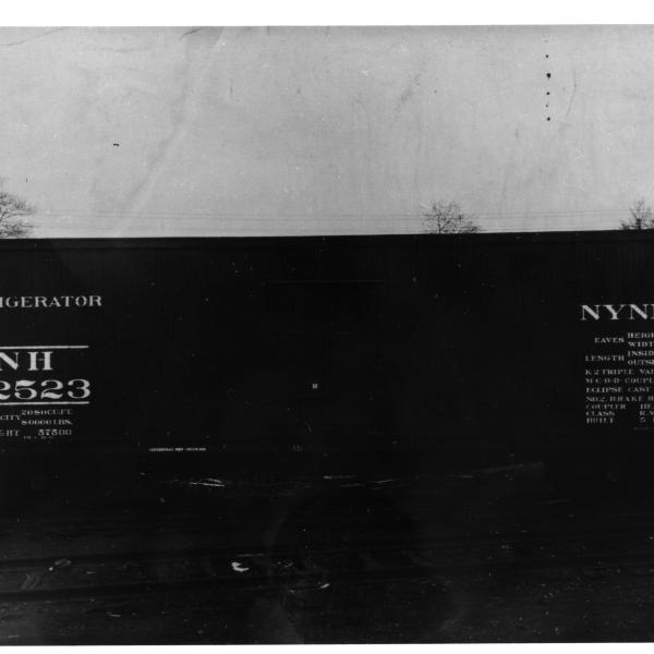 (Dark) side view of New Haven reefer 22523 in NYNH&H lettering