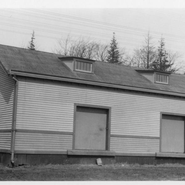 Street side of freight house with roof dormers