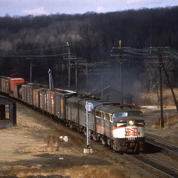 Freight with FA #0405 in McGinnis paint scheme at Hopewell Junction